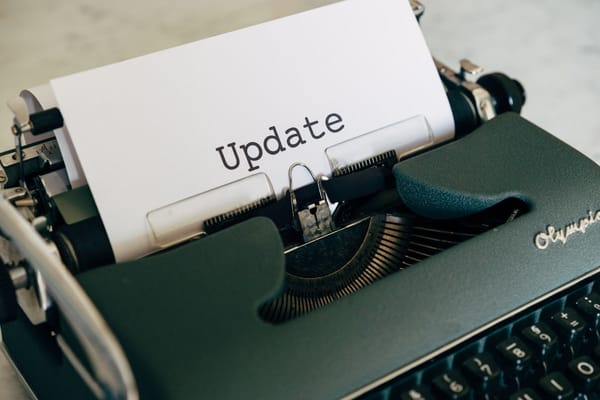 Digital security news headlines on a screen
